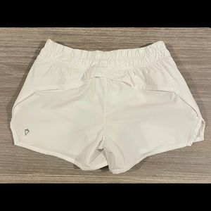 Girls Ivivva White Shorts. Never worn, and in great condition.